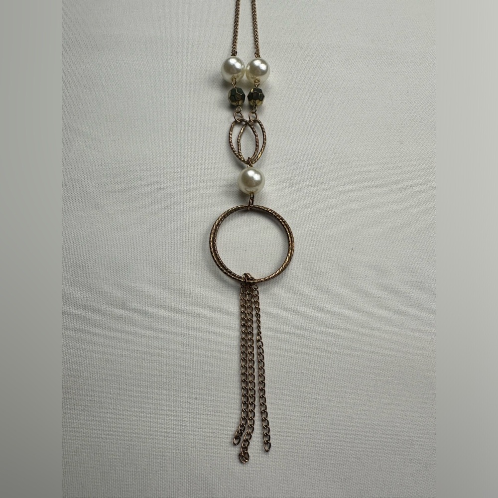 Silver and Pearl long necklace and faux pearl semi hoop earrings.